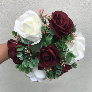 A bridesmaids bouquet of ivory & burgundy silk rose flowers