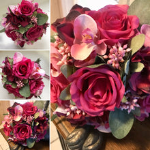 artificial wedding bouquet in shades of cerise and burgundy