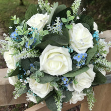 forget me nots and ivory roses wedding bouquet