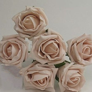 a wedding corsage featuring foam roses in a choice of over 35 colours