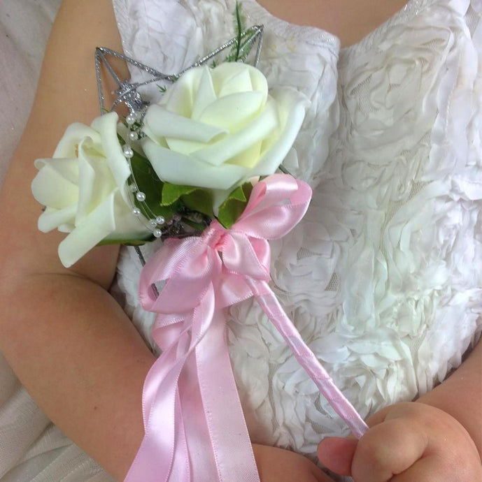 a bridesmaid flower wand ivory roses pink ribbon