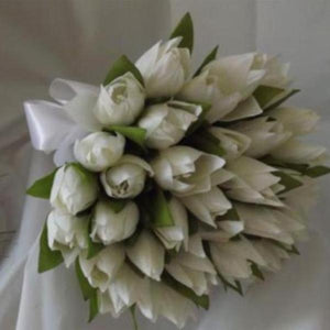 a wedding bouquet of artificial silk white tulips