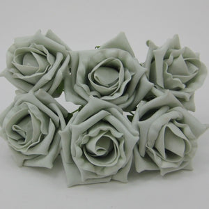 a wedding corsage featuring foam roses in a choice of over 35 colours